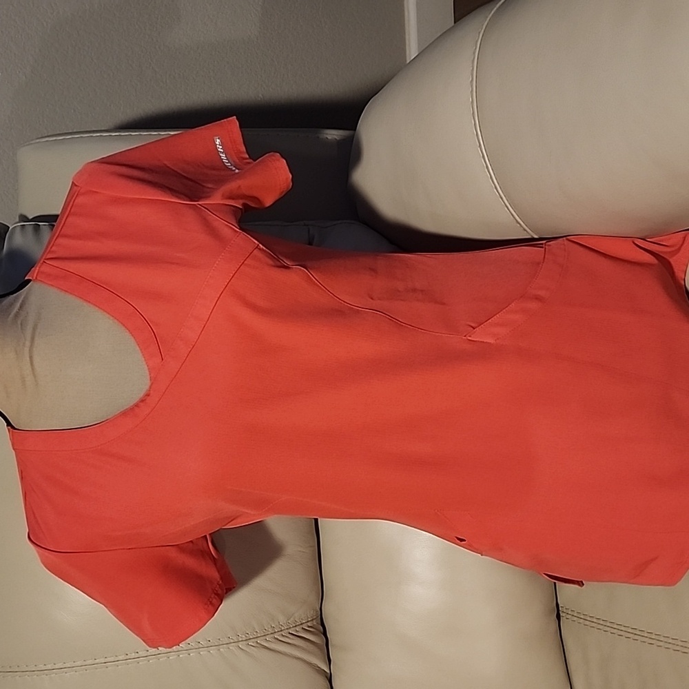 Soft tangerine scrub top